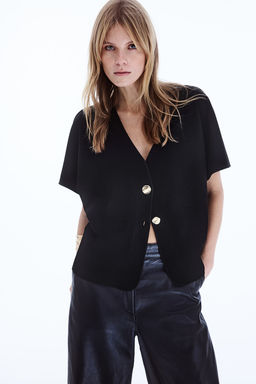 Top con botonadura frontal