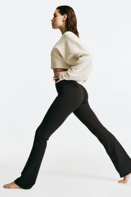 Leggings de yoga acampanados con SoftMove Lycra® - H&m фото 5