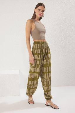 TRENDYOLMILLA K?rm?z? Etnik Desenli Pacalar? Lastikli Salvar Form Dokuma Pantolon TWOSS25PL00063