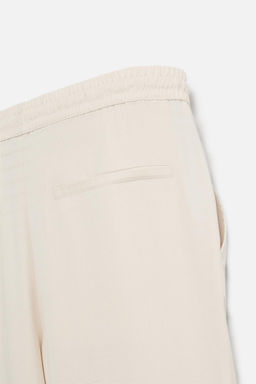 RELAXED FIT LYOCELL TROUSERS - Zara фото 30
