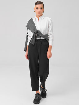 Брюки бананы