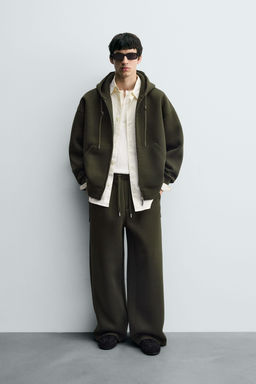 WIDE-LEG NEOPRENE EFFECT TROUSERS