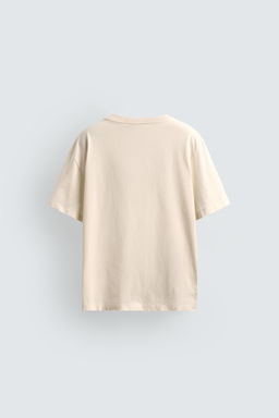 CAMISETA RELAXED FIT TEXTO LAVADO / Blanco roto