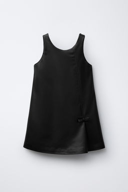 FAUX LEATHER PINAFORE DRESS WITH BOWS