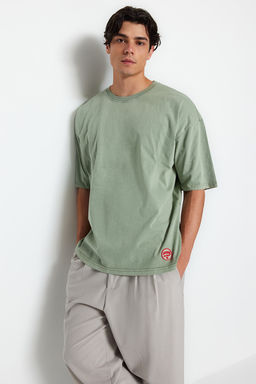 TRENDYOL MAN Premium Antrasit Oversize/Genis Kesim Soluk Efektli %100 Pamuklu T-Shirt TMNSS23TS00153