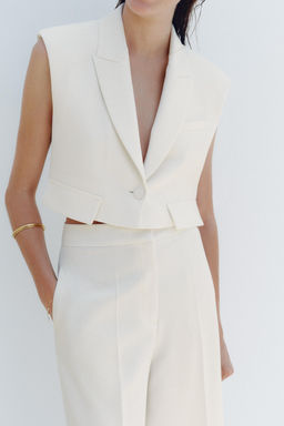 SHORT WAISTCOAT WITH FLAPS - Zara фото 2