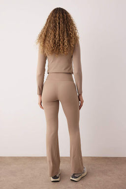 Siyah Soft F?rcal? Kumas Kruvaze Bel ve Cep Detayl? Ispanyol Paca Yoga Orme Spor Tayt THMAW26TY00000 - Trendyolmilla фото 8