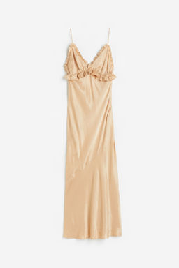 Vestido lencero con detalles de volante