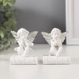 Цена за 2 шт. Фигурка полистоун «Ангелочек на книге с серебристыми крыльями», стразы, 4×4.5×6.5 см, МИКС