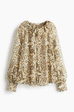 Blusa con cuello de volantes