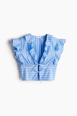 Blusa de popelina con cierre de lazada
