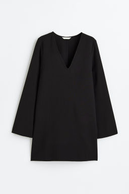 Vestido con escote de pico