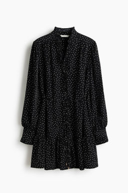 Vestido con ribetes de volante