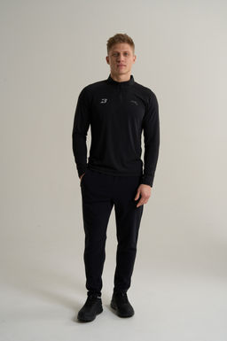Брюки трикотажные утепленные Черный ANTA RUNNING Knit Track Pants фото 2