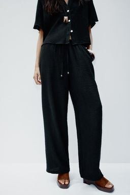 WIDE-LEG TROUSERS WITH ELASTIC WAISTBAND - Zara фото 30