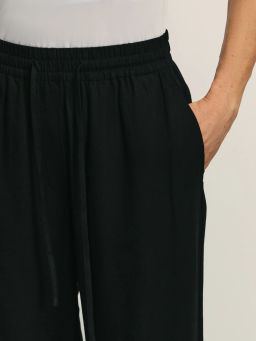 Широкие льняные брюки с эластичным поясом / Zarina  фото 5