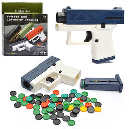 Пистолет "Агент" стреляет дисками, в коробке