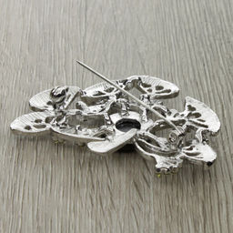 Брошь "Воздушный одуванчик" со вставкой из гелиотиса и ювелирного сплава