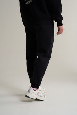 Брюки трикотажные Черный ANTA TRN Knit Track Pants фото 4