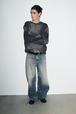 FADED-EFFECT RIPPED SWEATSHIRT