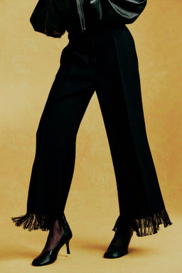 Pantalon con acabado desflecado - H&m фото 4