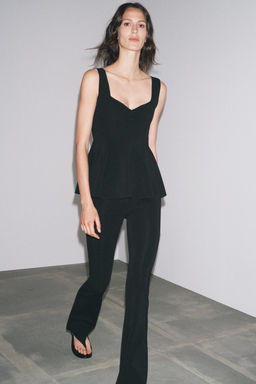 STRETCH FLARE TROUSERS