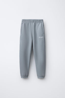 PANTAL?N JOGGER TEXTO / Gris perla