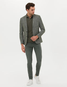 Зеленые джинсовые брюки узкого кроя