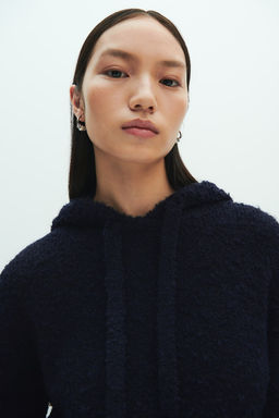Jersey en punto boucle con capucha