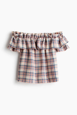 Top off-the-shoulder con volante