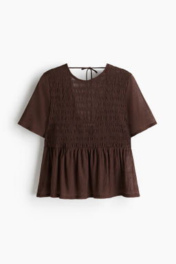 Top nido de abeja con peplum