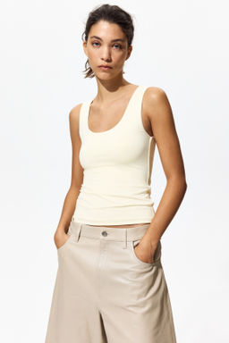 Top sin mangas en microfibra - H&m фото 9