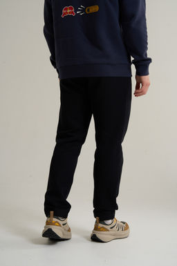 Брюки трикотажные Черный TRN ESSENTIAL Knit Track Pants - Anta фото 4