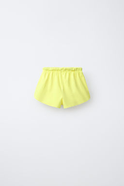 CONJUNTO JOGGING CAMISETA Y BERMUDA LISO / Amarillo