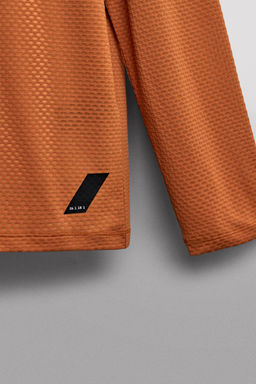 CAMISETA T?CNICA GRAVEL MANGA LARGA ESTRUCTURA / Ocre