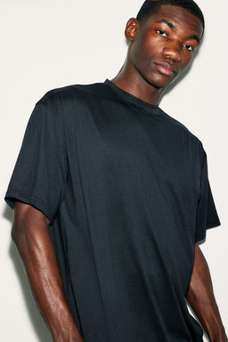 Camiseta de deporte en DryMove Loose Fit - H&m фото 2