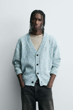 DISTRESSED TWISTED YARN CARDIGAN
