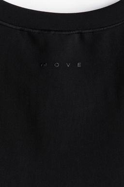 Top de deporte con SoftMove Slim Fit - H&m фото 10