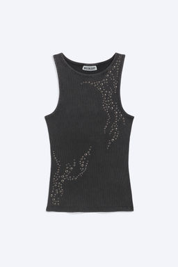 Top de tirantes con tachuelas