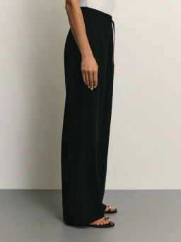 Широкие льняные брюки с эластичным поясом / Zarina  фото 3