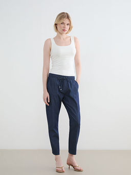 Джинсы Carrot Fit женские с эластичным поясом