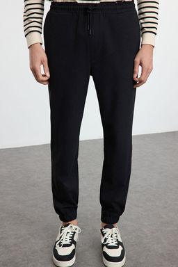 TRENDYOL MAN Gri Slim Fit Jogger Beli Baglamal? Lastikli Kumas Pantolon TMNAW25PL00000