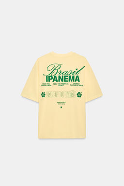CAMISETA EFECTO LAVADO TEXTO / Amarillo
