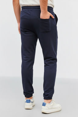 Lacivert Regular Fit Bask?l? Biyeli Lastik Paca Esofman Alt? TMNSS22EA0121