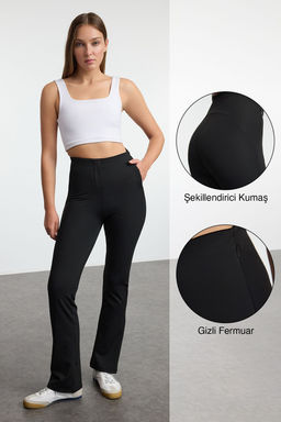 TRENDYOLMILLA Siyah Toparlay?c? Fermuarl? Cep Detayl? Tam Boy Orme Spor Pantolonu THMAW25TY00019