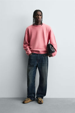 SWEATER WITH TEXTURED REVERSIBLE SEAMS