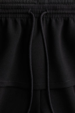 Pantal?n efecto neopreno con falda superpuesta - H&m фото 5