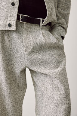 Pantalon brillante con textura Relaxed Fit - H&m фото 2