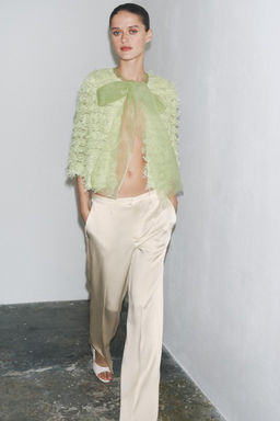 FRINGED KNIT CARDIGAN WITH ORGANZA TIE