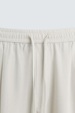 RELAXED FIT FLOWING TROUSERS - Zara фото 8